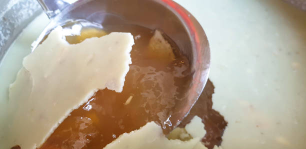 A layer of fat on beef broth