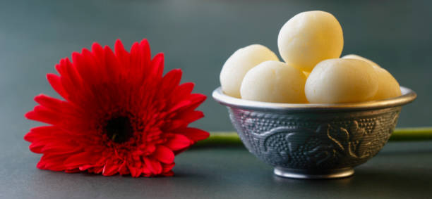 Indian Rasgulla or dry Rosogulla dessert/sweet served in a bowl