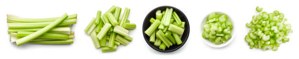 Heap of chopped celery isolated on white background, top view